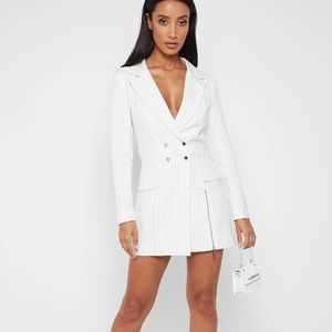 A dress that looks like a suit with a split